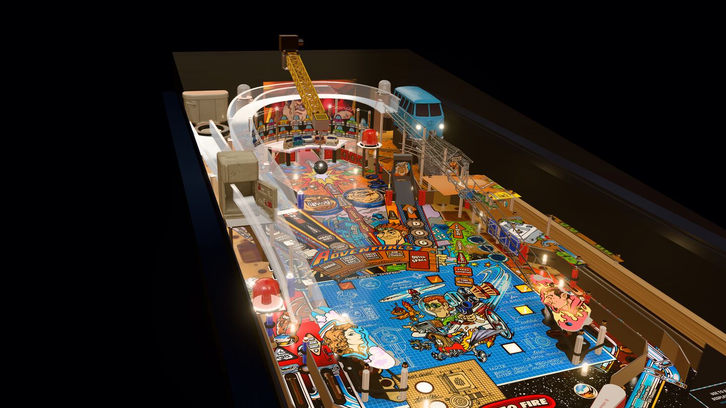 Our 3-D Junk Yard playfield at night: the yellow crane and wrecking ball, the Magic Bus, the refrigerator and the blueprint panel, seen from the player's side.